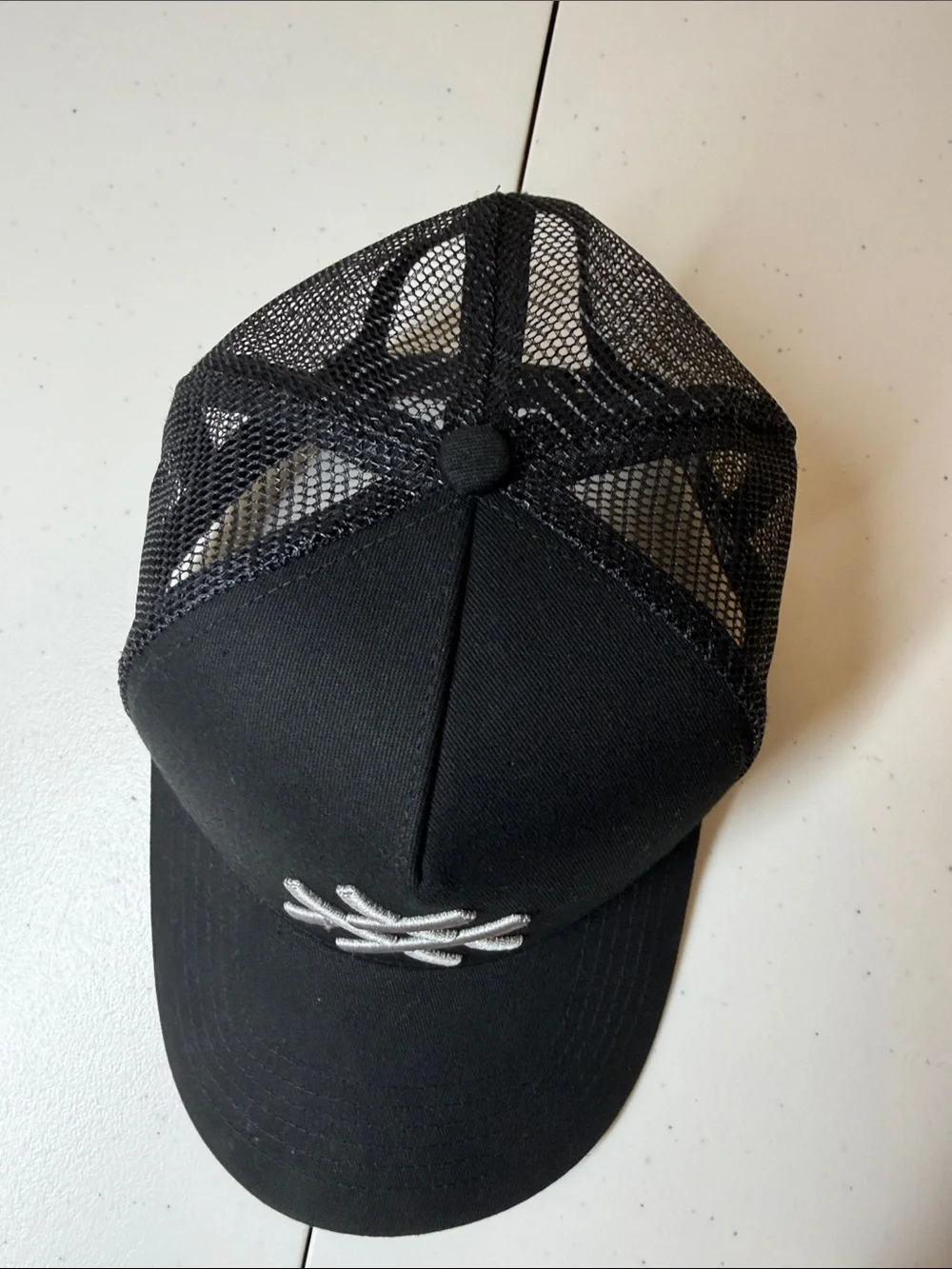 Lucid FC Black Trucker Hat with Silver Embroidered Geometric Logo, Rihanna style